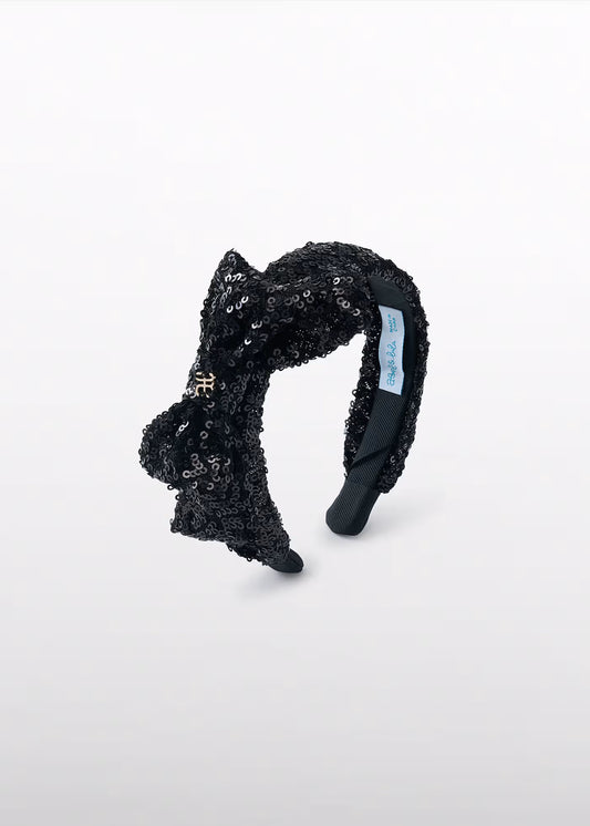 Black sequined headband on a white background