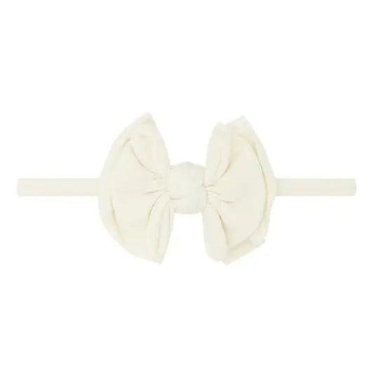Ivory colored headband with bow in center