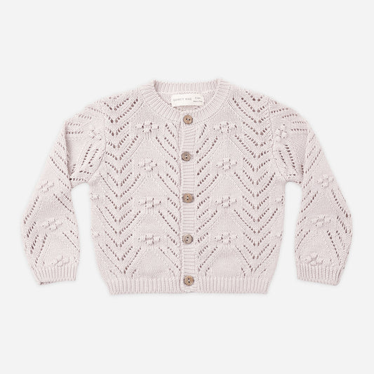Baby wearing Quincy Mae Lilac Mist knit cardigan