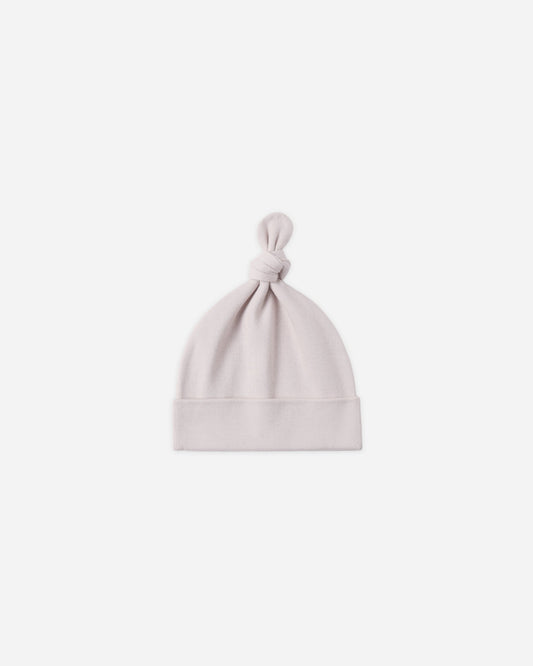 Baby wearing Quincy Mae Lilac Mist knotted baby hat