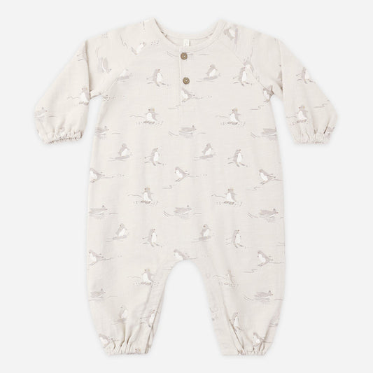 Skiing penguins henley romper by Rylee and Cru laid flat