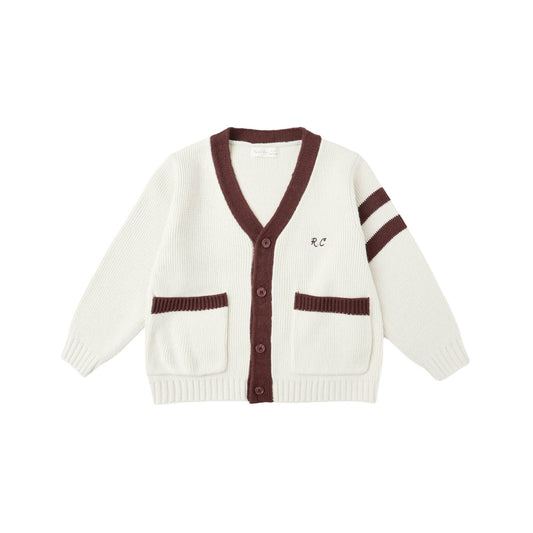 White cardigan with burgundy trim on a white background