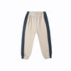 Beige sweatpants with navy side stripes on a white background