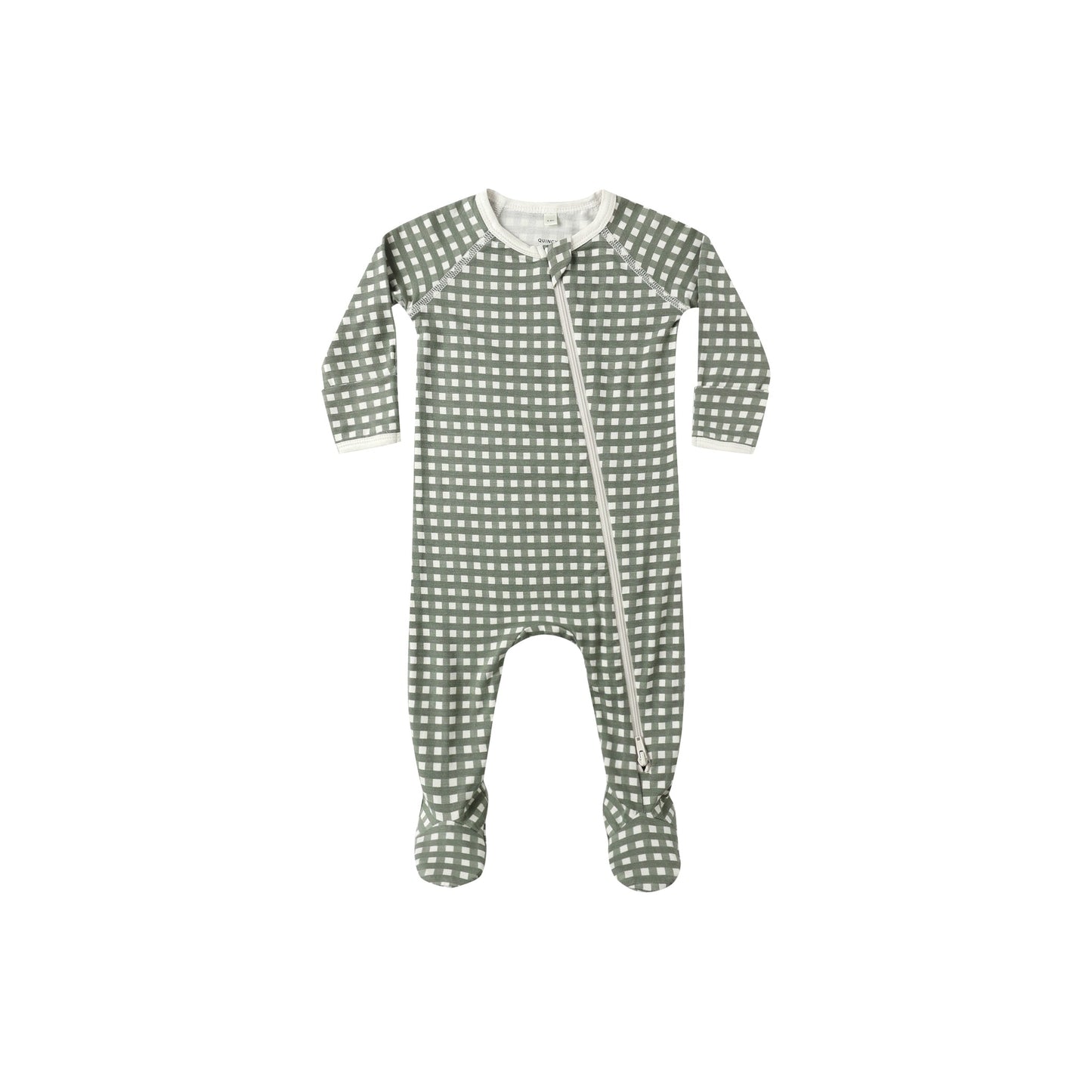 Green polka dot baby onesie on a white background