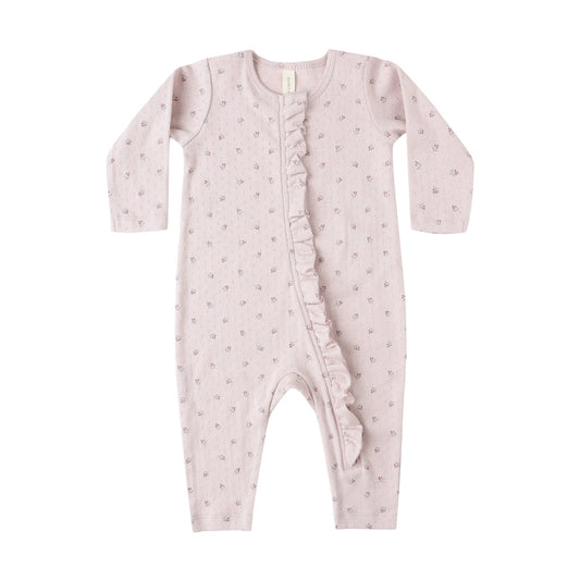 Pink baby onesie with star pattern on a white background