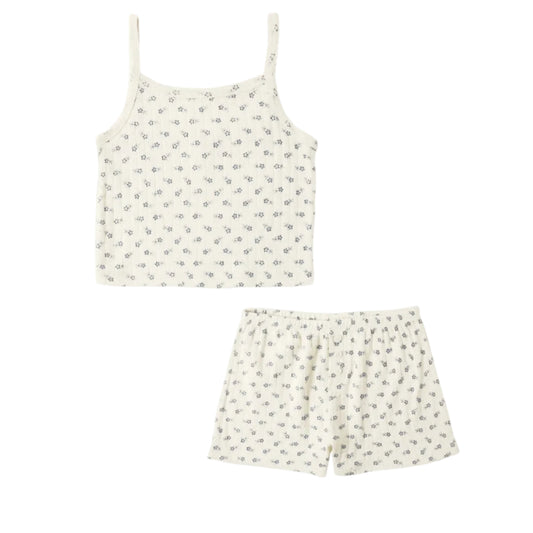 Floral-patterned top and shorts set on a white background