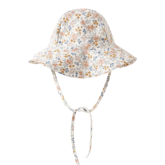 Floral patterned sun hat on a white background