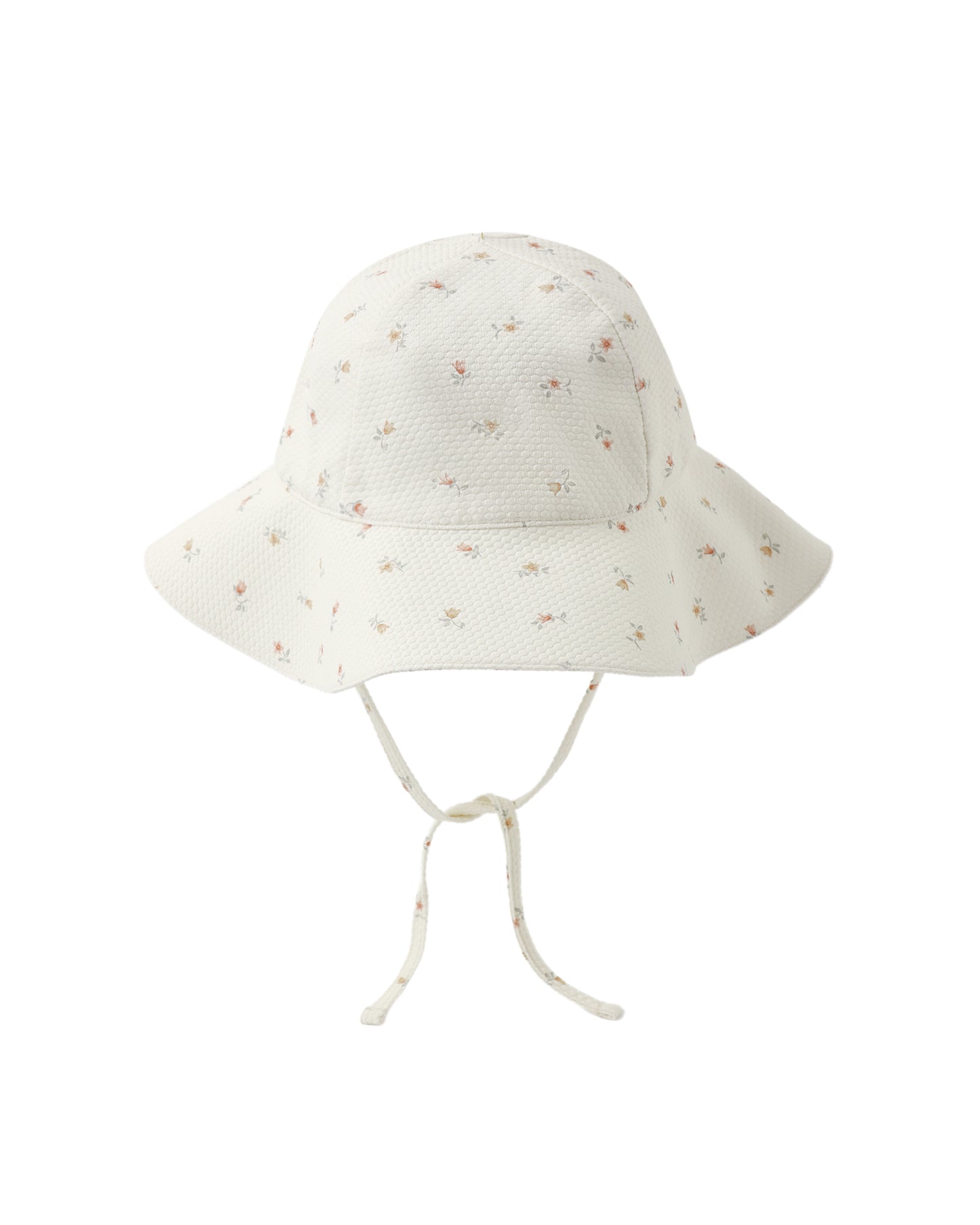 White baby sun hat with small floral pattern on a white background