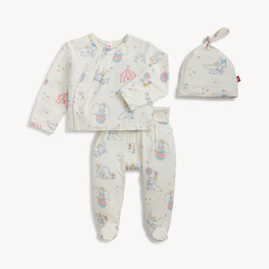 Baby outfit set with top, pants, and hat on a white background