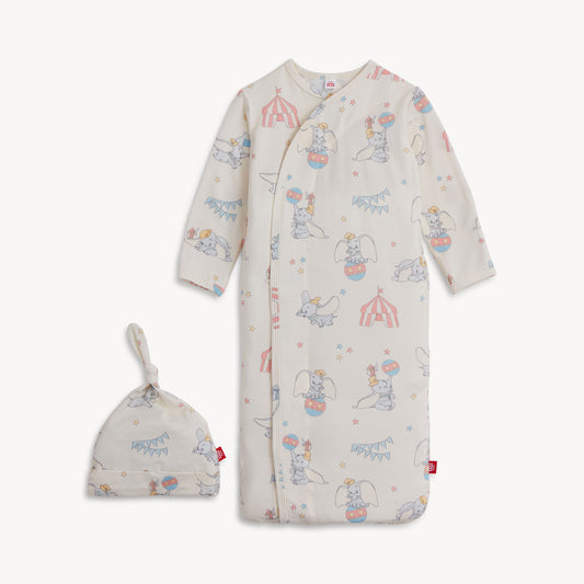 Baby sleeping bag with cartoon design and matching hat on a white background