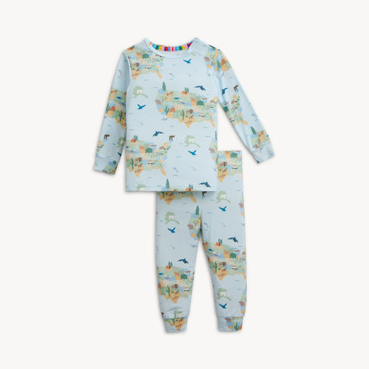 Children's pajama set with animal print on a white background