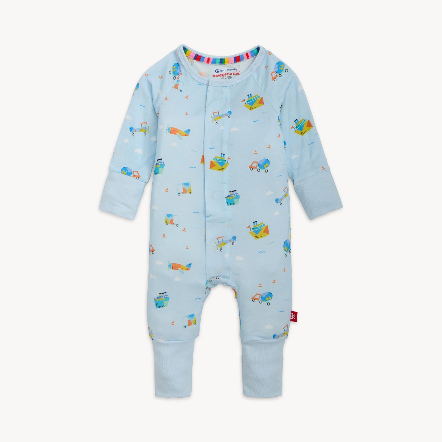 Light blue baby onesie with colorful vehicle prints on a white background