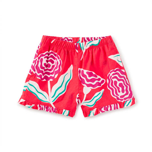 Red shorts with pink floral patterns