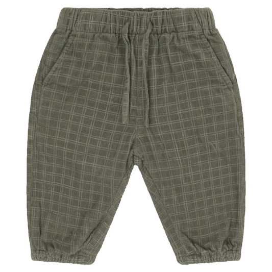 Plaid patterned pants on a white background