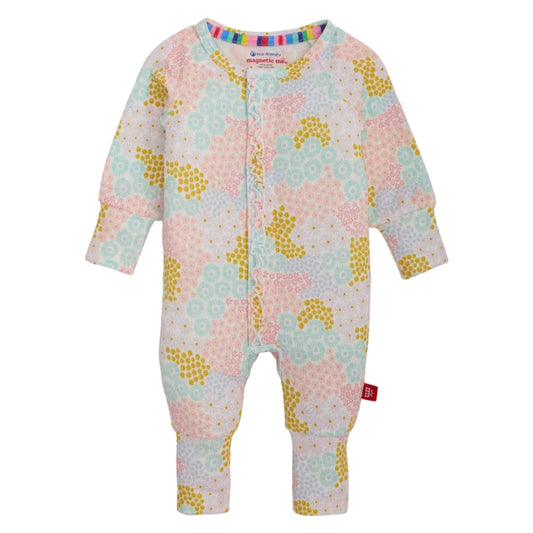 Baby onesie with floral pattern on a white background