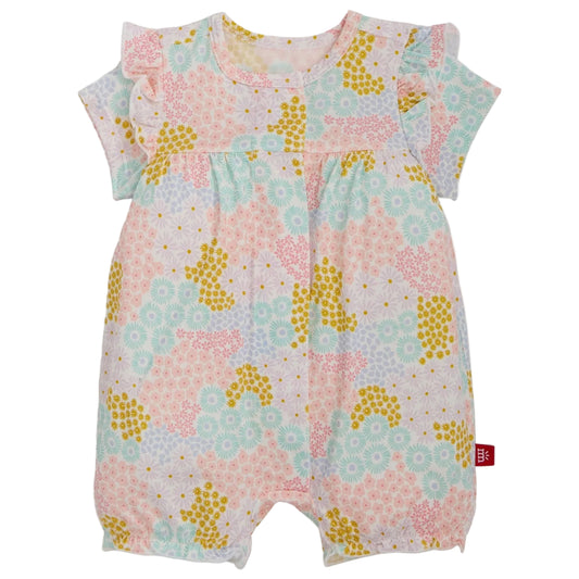 Floral patterned baby romper on a white background