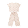 Children's pajama set with a pink and white pattern on a white background