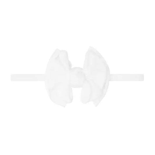 White headband with bow in the center