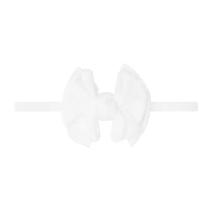 White headband with bow in the center