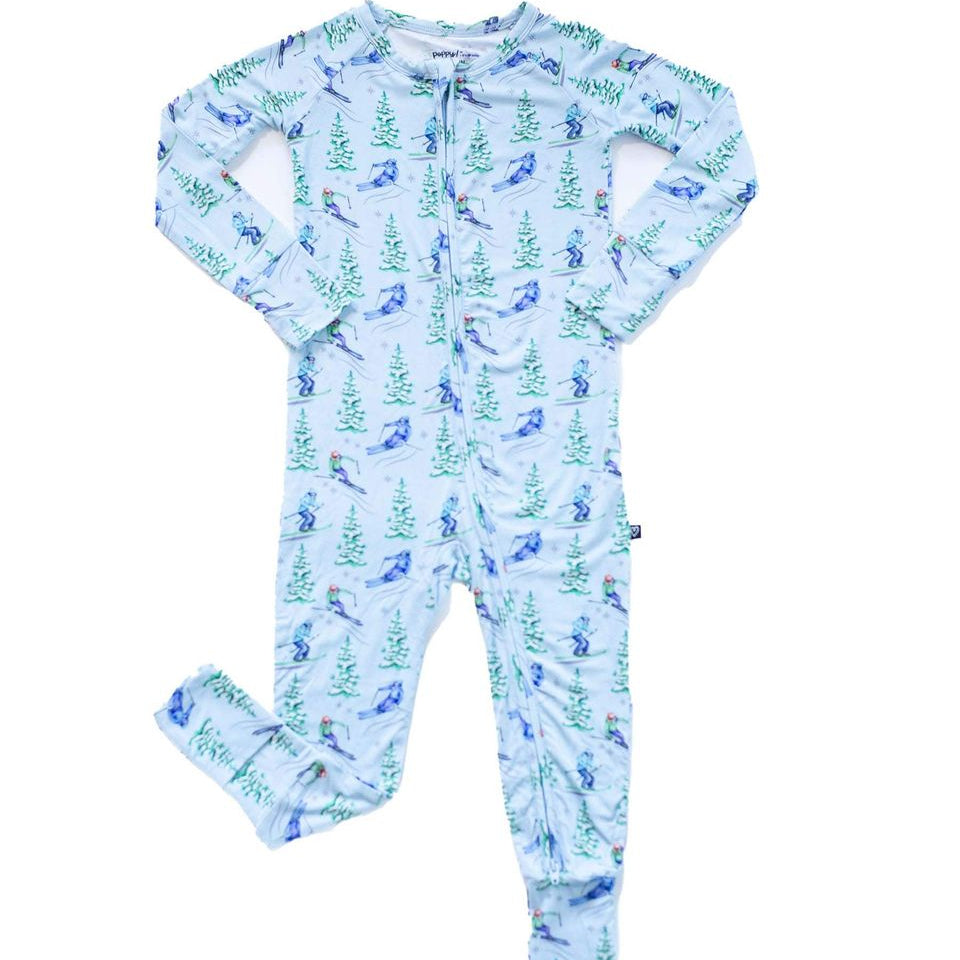 Children's onesie with a blue and green pattern on a white background