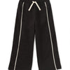 Black track pants with white lace trim on the legs and a drawstring waist.