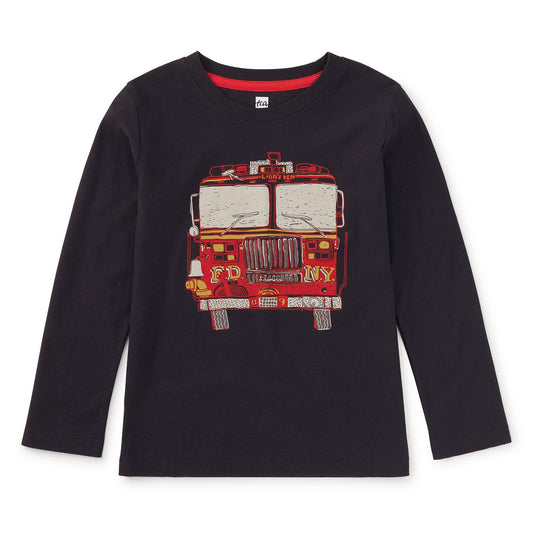 A long sleeve indigo blue t-shirt with a graphic of a red fire truck on the front.