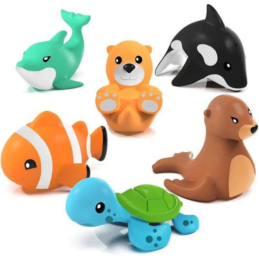 Set of six colorful animal toys on a white background