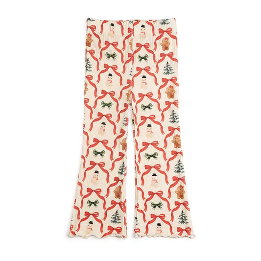 Pajama pants with Christmas-themed pattern on a white background