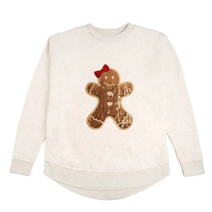 Beige sweatshirt with a sequined gingerbread man design on a white background