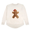 Beige sweatshirt with a sequined gingerbread man design on a white background