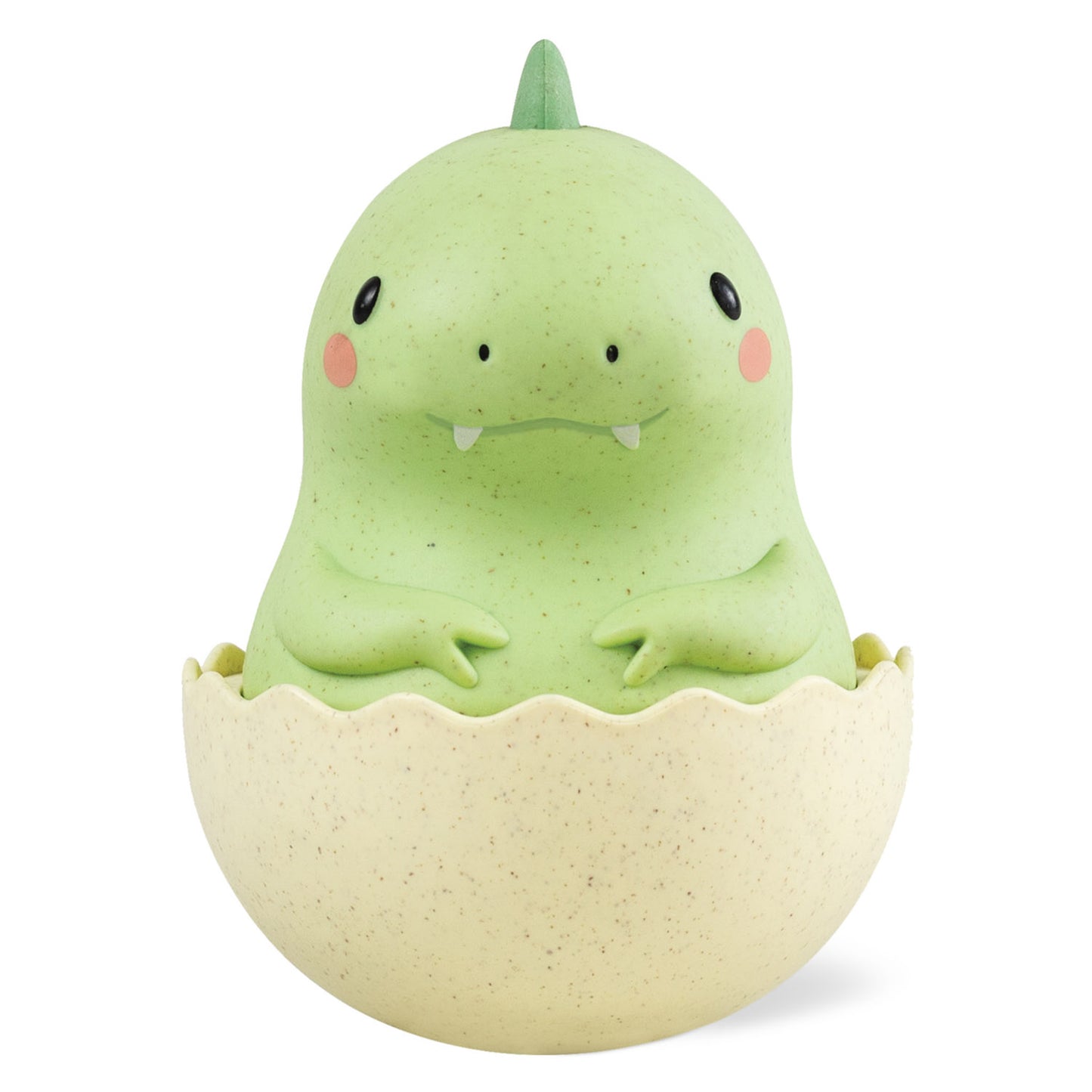 Green dinosaur toy in an egg on a white background