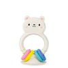 White bear-shaped teething ring with colorful rings on a white background