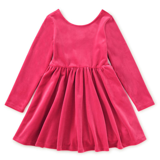 Pink velour dress on a white background