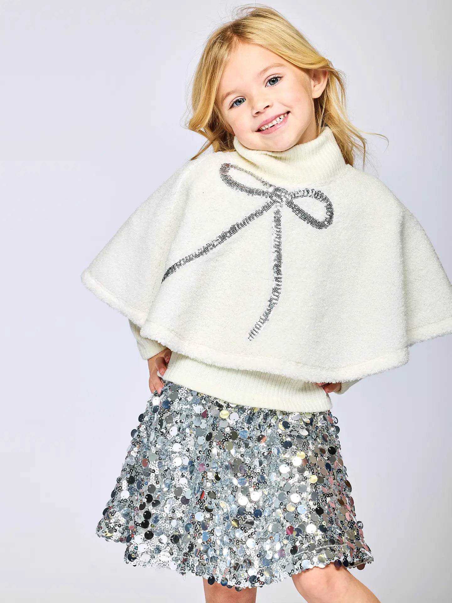 Sequin Bow Sherpa Poncho