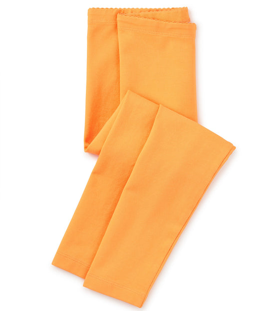 A pair of girls' mustard leggings