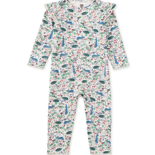 Children's onesie with a floral and whale pattern on a white background