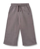 Purple sweatpants with a small logo on a white background