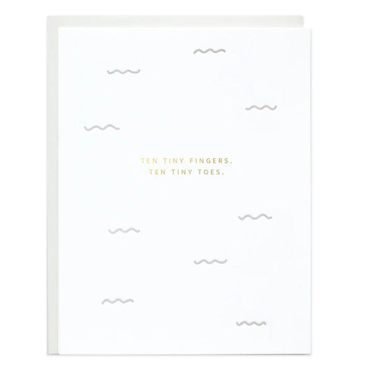Minimalist letterpress new baby card with gold foil lettering