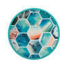 Round decorative plate with hexagonal mosaic design featuring beach scenes on a white background