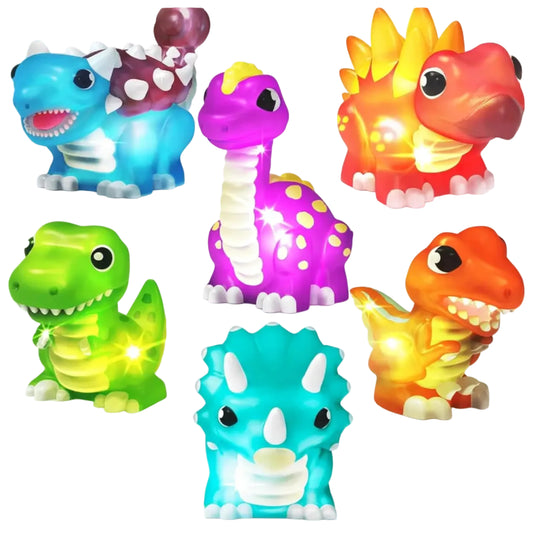 Set of colorful dinosaur toys with lights on a white background