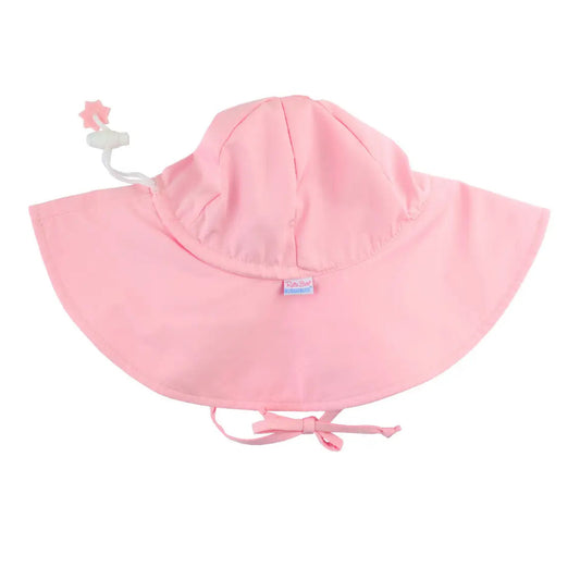 pink sun hat with ties on a white background