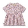 Floral dress with a visible brand label on a white background
