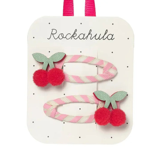 Set of hair clips with cherries and candy cane design on a Rockahula branded card.