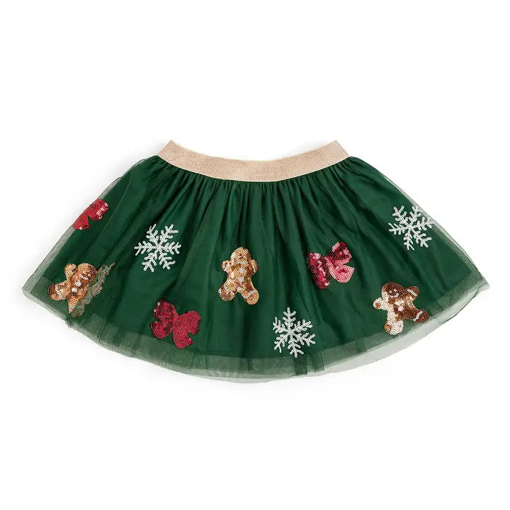 Green tutu skirt with gingerbread men and snowflakes on a white background