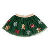 Green tutu skirt with gingerbread men and snowflakes on a white background