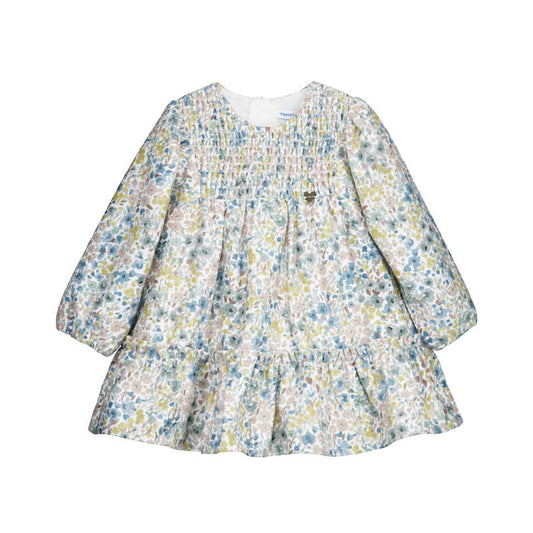 Aqua floral dress with smocking at the neckline and long sleeves