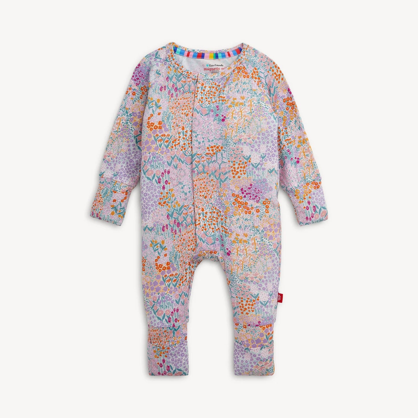 A baby long-sleeve one-piece romper with an all-over colorful floral and butterfly pattern on a light pink base.