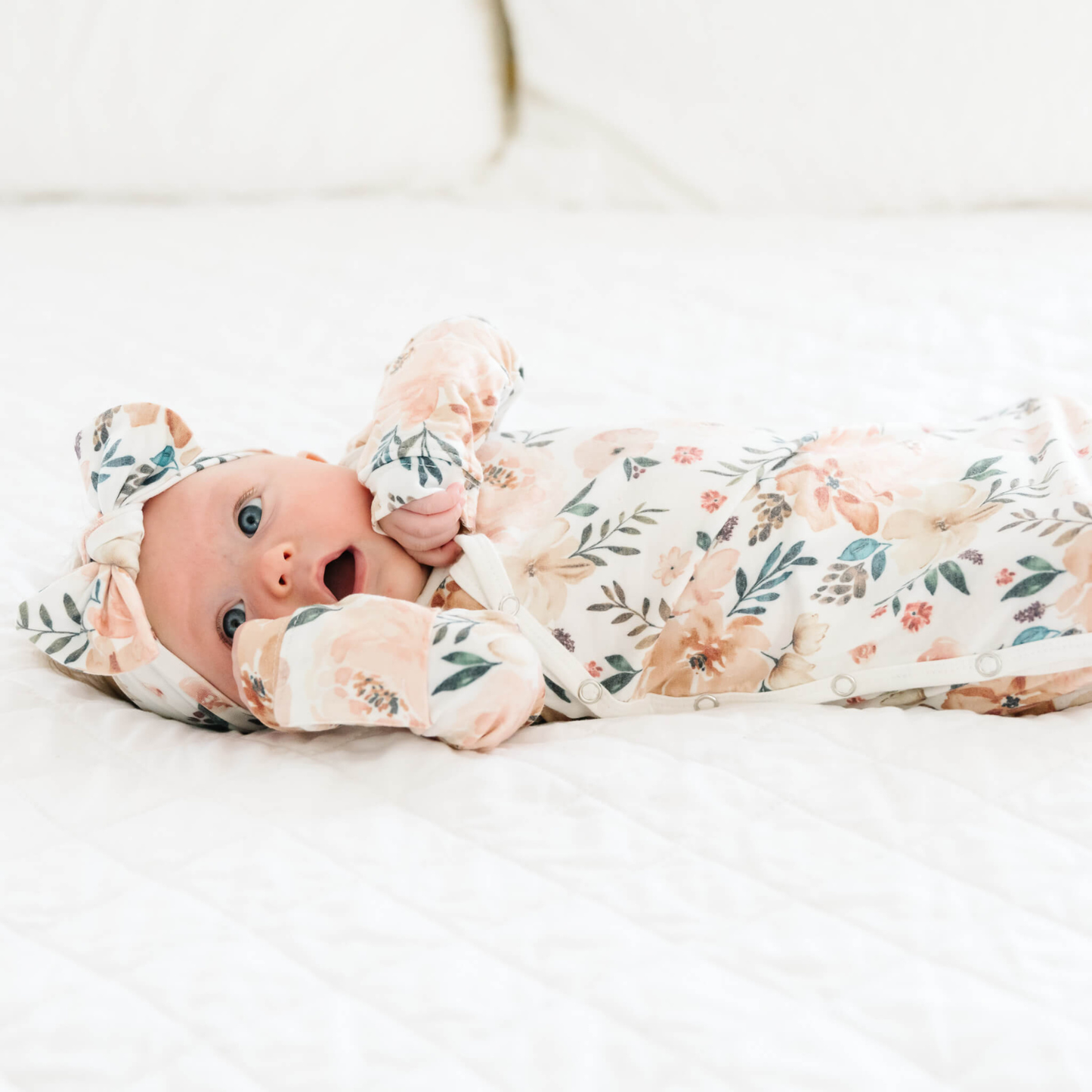 Floral baby knotted gown with peach flowers on white