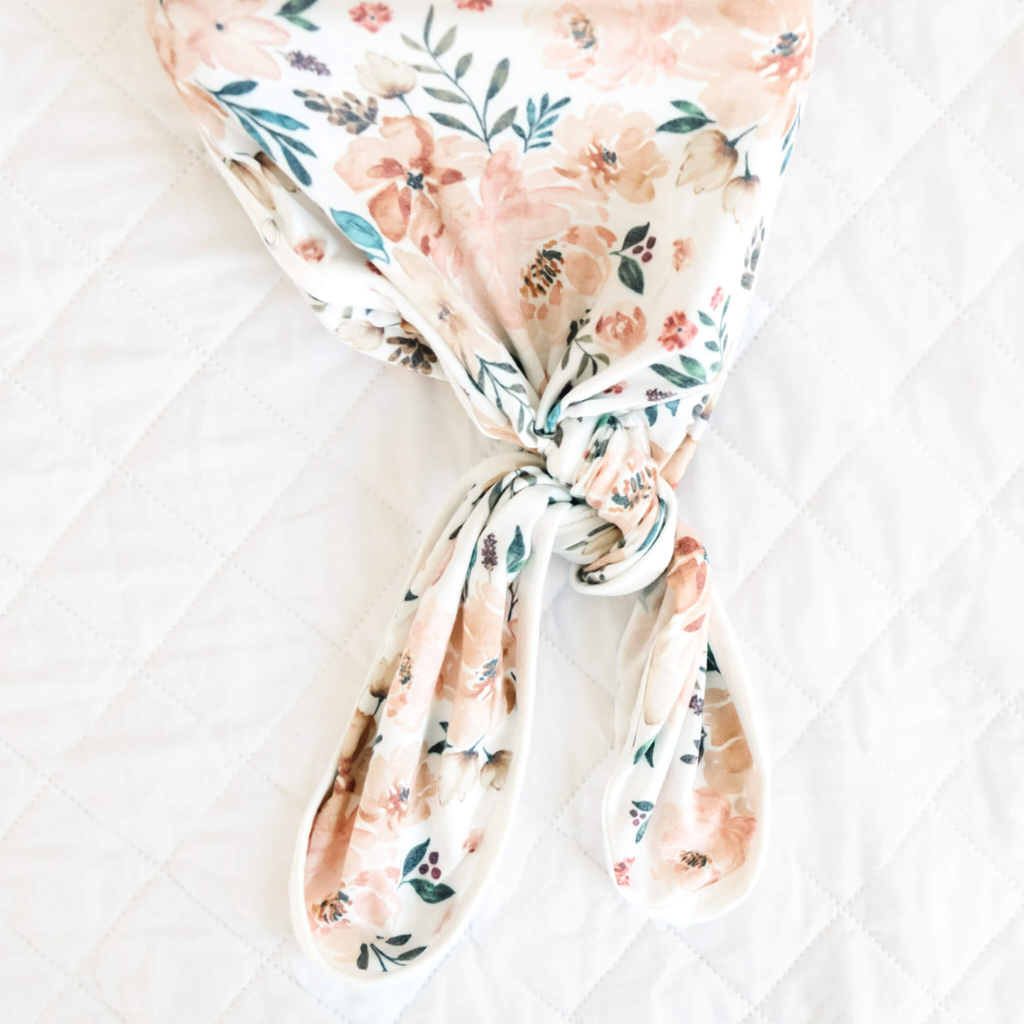 Floral baby knotted gown with peach flowers on white