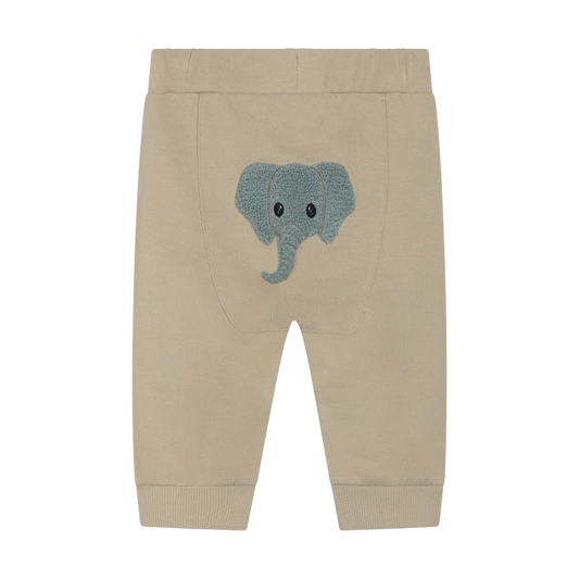 Beige baby pants with a blue elephant applique on a white background